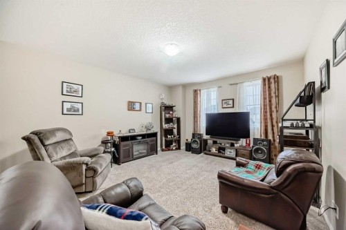 132 Waterlily Cove, Chestermere, AB - Indoor Photo Showing Living Room
