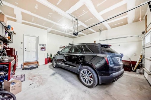 132 Waterlily Cove, Chestermere, AB - Indoor Photo Showing Garage