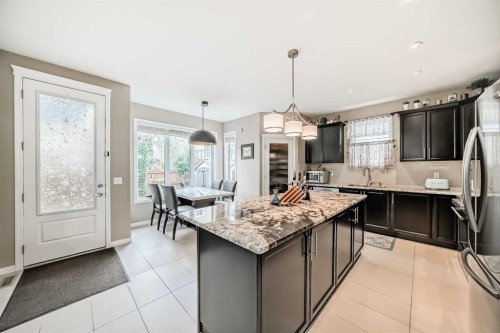 132 Waterlily Cove, Chestermere, AB - Indoor Photo Showing Kitchen With Upgraded Kitchen
