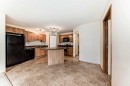 106-20 Panatella Landing Nw, Calgary, AB  - Indoor Photo Showing Kitchen 