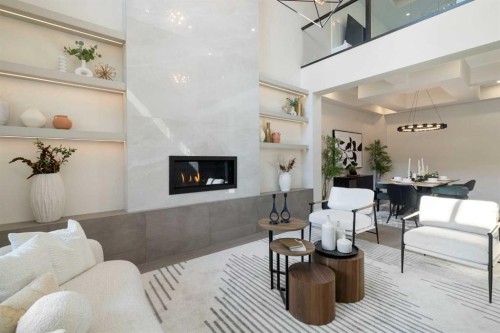 232 West Chestermere Drive, Chestermere, AB - Indoor Photo Showing Living Room With Fireplace