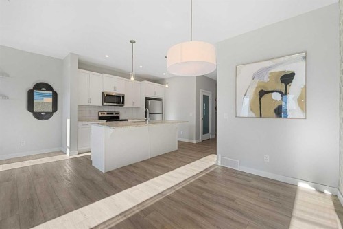 129 Hotchkiss Way Se, Calgary, AB - Indoor Photo Showing Kitchen With Upgraded Kitchen