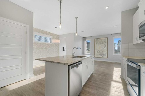 129 Hotchkiss Way Se, Calgary, AB - Indoor Photo Showing Kitchen With Upgraded Kitchen