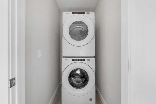 129 Hotchkiss Way Se, Calgary, AB - Indoor Photo Showing Laundry Room