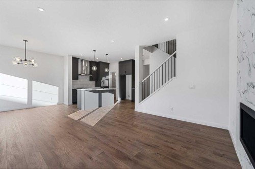 95 Dawson Wharf Mount, Chestermere, AB - Indoor With Fireplace