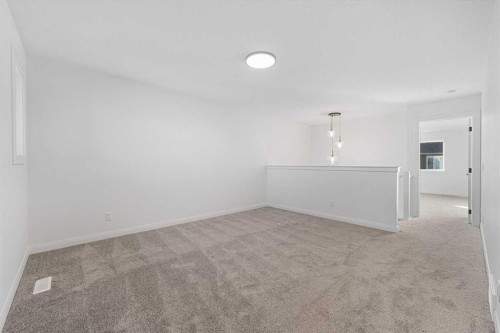 95 Dawson Wharf Mount, Chestermere, AB - Indoor Photo Showing Other Room