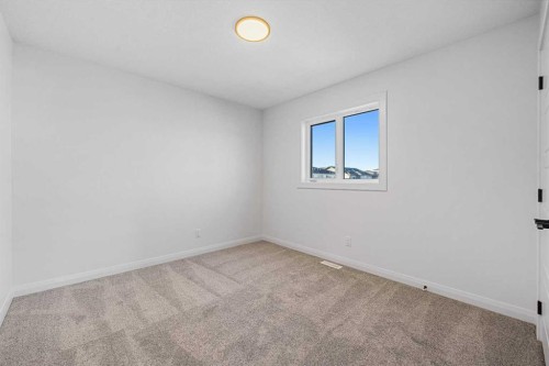 95 Dawson Wharf Mount, Chestermere, AB - Indoor Photo Showing Other Room