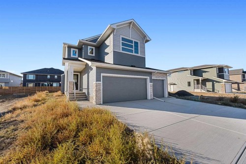95 Dawson Wharf Mount, Chestermere, AB - Outdoor With Facade