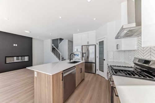374 Corner Glen Way Ne, Calgary, AB - Indoor Photo Showing Kitchen With Double Sink With Upgraded Kitchen