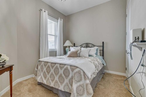 109 Amery Crescent, Crossfield, AB - Indoor Photo Showing Bedroom