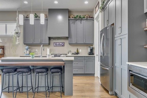 109 Amery Crescent, Crossfield, AB - Indoor Photo Showing Kitchen With Upgraded Kitchen