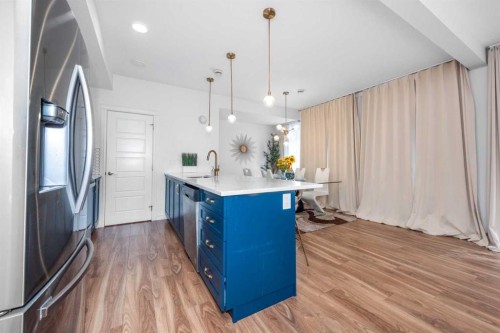 4339 Seton Drive Se, Calgary, AB - Indoor Photo Showing Kitchen With Upgraded Kitchen