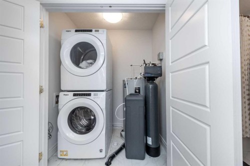 4339 Seton Drive Se, Calgary, AB - Indoor Photo Showing Laundry Room