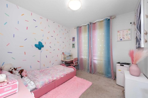 4339 Seton Drive Se, Calgary, AB - Indoor Photo Showing Bedroom