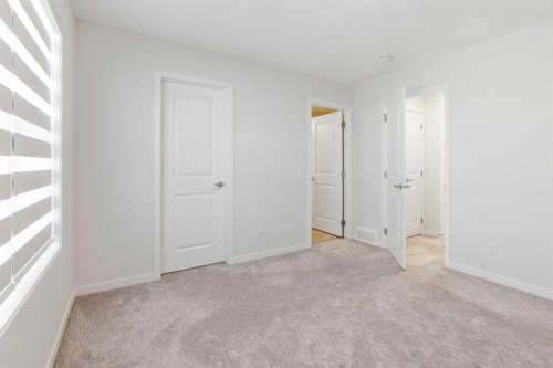201 Magnolia Terrace Se, Calgary, AB - Indoor Photo Showing Other Room