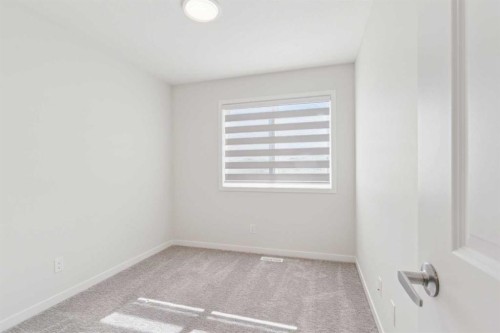 201 Magnolia Terrace Se, Calgary, AB - Indoor Photo Showing Other Room