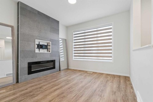 201 Magnolia Terrace Se, Calgary, AB - Indoor With Fireplace