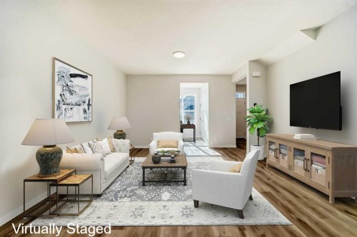 1030 Sawgrass Link Nw, Airdrie, AB - Indoor Photo Showing Living Room