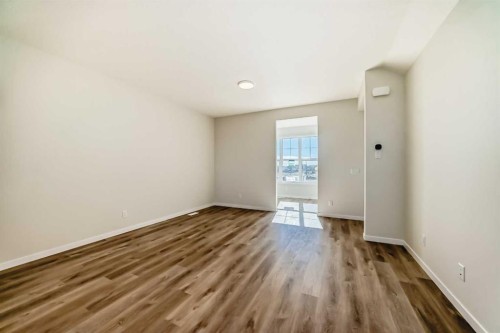 1030 Sawgrass Link Nw, Airdrie, AB - Indoor Photo Showing Other Room