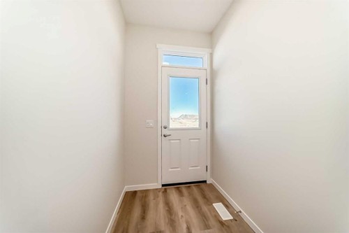 1030 Sawgrass Link Nw, Airdrie, AB - Indoor Photo Showing Other Room