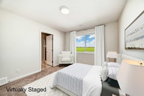 1030 Sawgrass Link Nw, Airdrie, AB - Indoor Photo Showing Bedroom