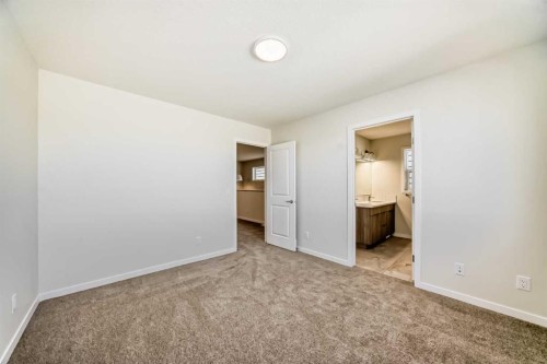 1030 Sawgrass Link Nw, Airdrie, AB - Indoor Photo Showing Other Room