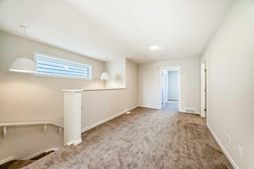 1030 Sawgrass Link Nw, Airdrie, AB - Indoor Photo Showing Other Room