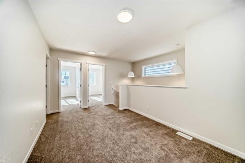 1030 Sawgrass Link Nw, Airdrie, AB - Indoor Photo Showing Other Room
