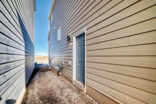 1030 Sawgrass Link Nw, Airdrie, AB - Outdoor With Exterior