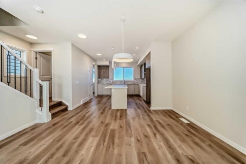 1030 Sawgrass Link Nw, Airdrie, AB - Indoor Photo Showing Other Room