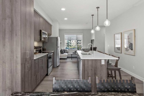 507 Shawnee Square Sw, Calgary, AB - Indoor Photo Showing Kitchen With Upgraded Kitchen