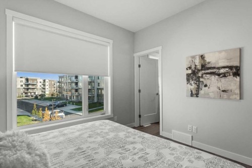 507 Shawnee Square Sw, Calgary, AB - Indoor Photo Showing Bedroom