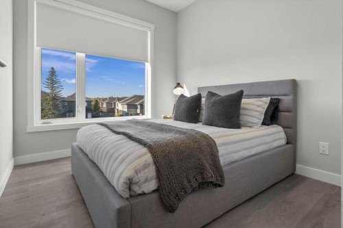 507 Shawnee Square Sw, Calgary, AB - Indoor Photo Showing Bedroom