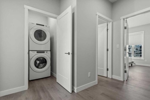 507 Shawnee Square Sw, Calgary, AB - Indoor Photo Showing Laundry Room