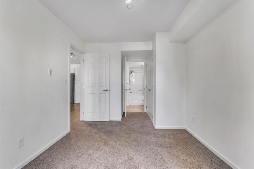 1211-755 Copperpond Boulevard Se, Calgary, AB - Indoor Photo Showing Other Room
