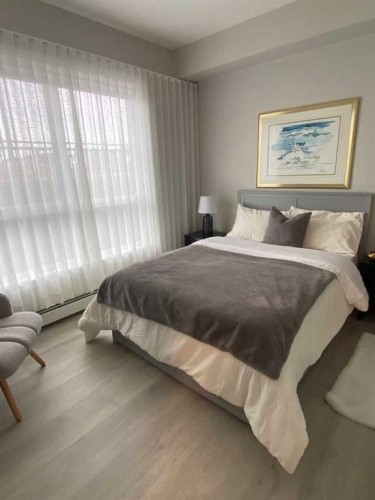 2106-100 Banister Drive, Okotoks, AB - Indoor Photo Showing Bedroom