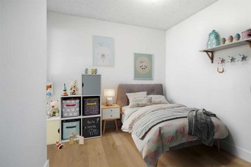 91 Deerfield Drive Se, Calgary, AB - Indoor Photo Showing Bedroom