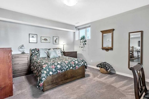 394 Cimarron Boulevard, Okotoks, AB - Indoor Photo Showing Bedroom