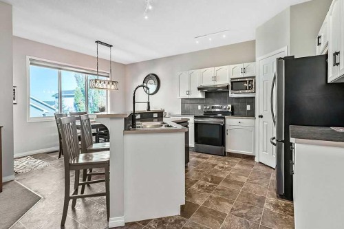 394 Cimarron Boulevard, Okotoks, AB - Indoor Photo Showing Kitchen