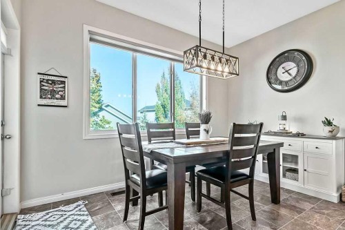394 Cimarron Boulevard, Okotoks, AB - Indoor Photo Showing Dining Room