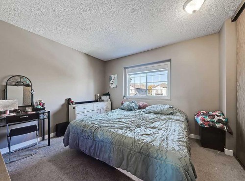 292 Coventry Close Ne, Calgary, AB - Indoor Photo Showing Bedroom