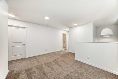1038 Sawgrass Link Nw, Airdrie, AB - Indoor Photo Showing Other Room