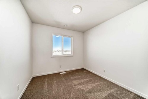 1038 Sawgrass Link Nw, Airdrie, AB - Indoor Photo Showing Other Room