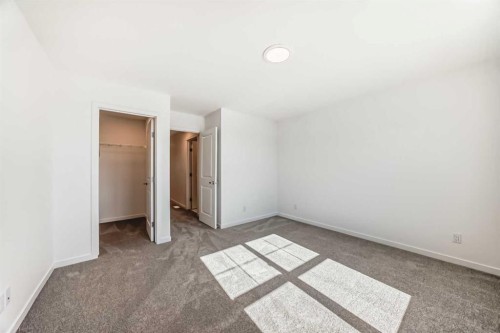 1038 Sawgrass Link Nw, Airdrie, AB - Indoor Photo Showing Other Room