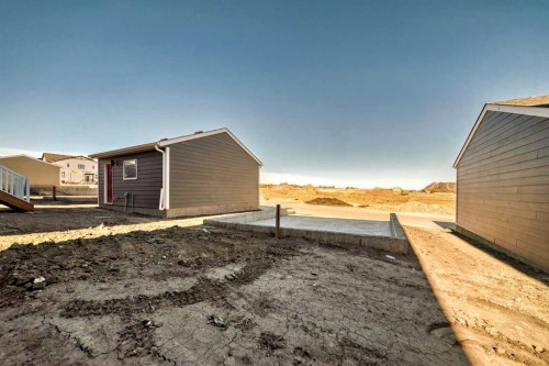 1038 Sawgrass Link Nw, Airdrie, AB - Outdoor With Exterior