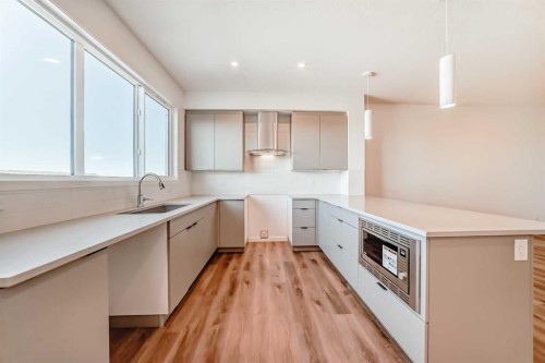 1038 Sawgrass Link Nw, Airdrie, AB - Indoor Photo Showing Kitchen With Upgraded Kitchen