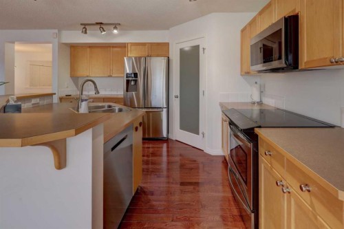 160 Rockywood Park Nw, Calgary, AB - Indoor Photo Showing Kitchen With Stainless Steel Kitchen With Double Sink