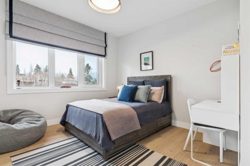 708 Crescent Boulevard Sw, Calgary, AB - Indoor Photo Showing Bedroom