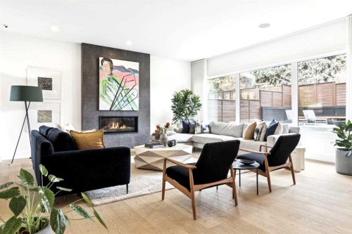 708 Crescent Boulevard Sw, Calgary, AB - Indoor Photo Showing Living Room With Fireplace