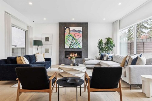 708 Crescent Boulevard Sw, Calgary, AB - Indoor Photo Showing Living Room With Fireplace